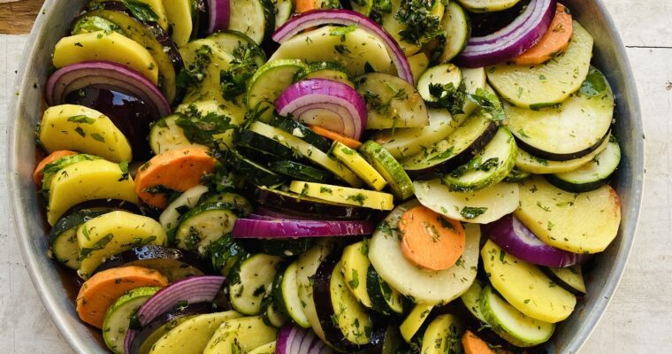 overhead image of traditional greek tray baked vegetables